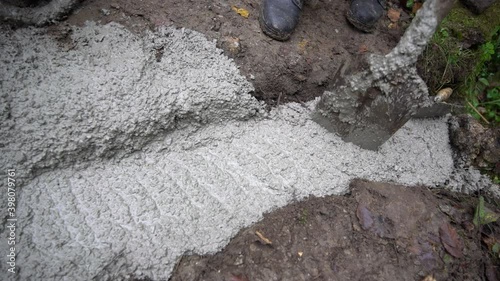 Close up of working with fresh concrete