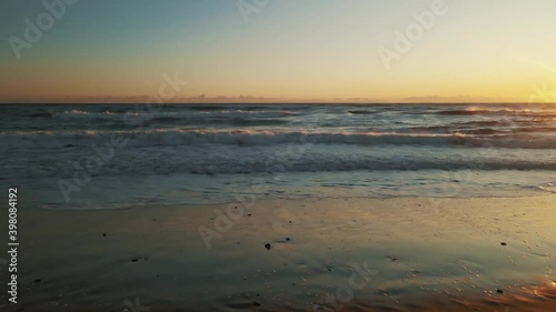 Wallpaper Mural Aerial view of ocean waves during sunset slowly moving forward Torontodigital.ca