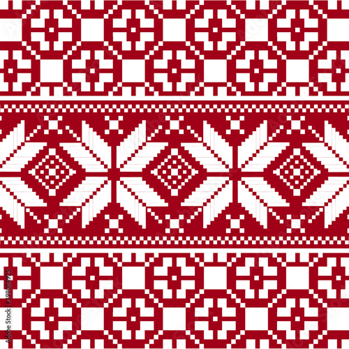 Knitted Christmas seamless pattern in red with geometric pattern