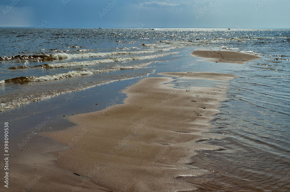 Sandy beach by the sea.