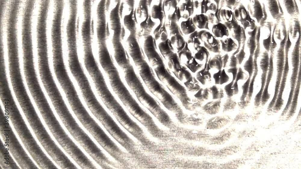A concentric wave-train grows in complexity.