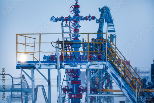 Overhaul of gas wells, coiled tubing installation, Gas-hole spot preventer. Oil, gas industry. Group wellheads and valve armature , Gas valve, Gas well of high pressure, shooting in the snow photo