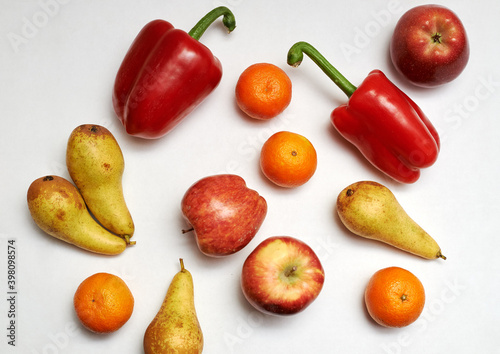 Fototapeta Naklejka Na Ścianę i Meble -  fresh fruits, pears apples tangerines and red bell peppers