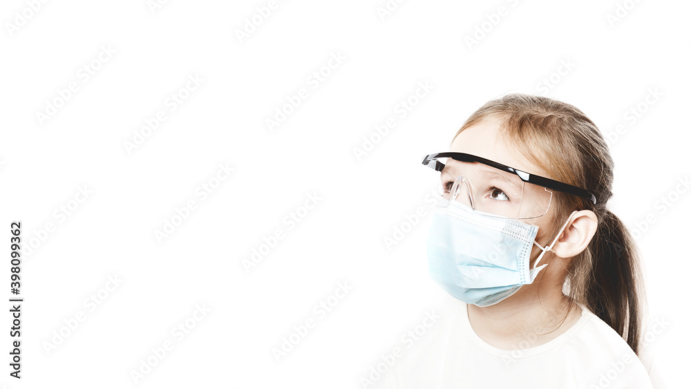 Coronavirus protection. The face of a child in a mask and glasses. A little preschool girl observes the prevention of covid 19. Children's health and viruses. Respiratory protection for babies Coronavirus protection. The face of a child in a mask and glasses. A little preschool girl observes the prevention of covid 19. Children's health and viruses. Respiratory protection for babies