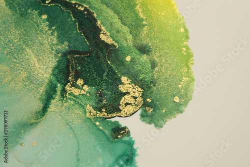 Art Abstract painting green blots background. Alcohol ink colors. Marble texture.