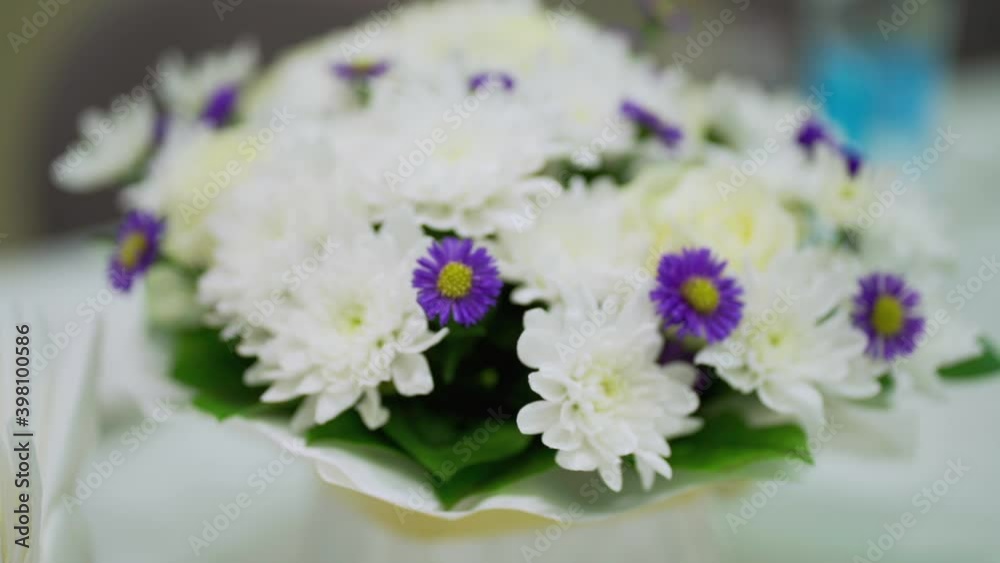 White and purple flowers bouquet close up handheld shot White and purple flowers bouquet close up handheld shot
