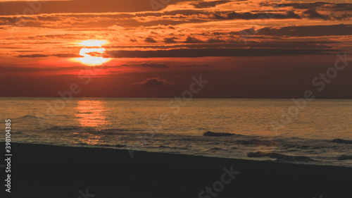 Sunset on the Baltic Sea on the beach in Krynica Morska