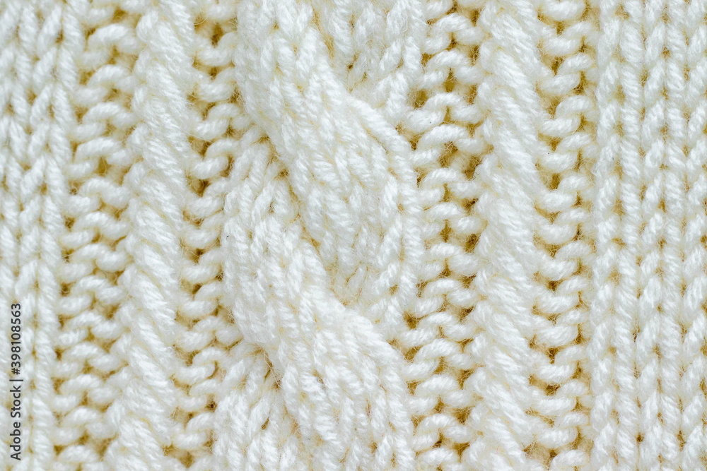 knitting hobby knitted background of milky color with a pattern knitting hobby knitted background of milky color with a pattern