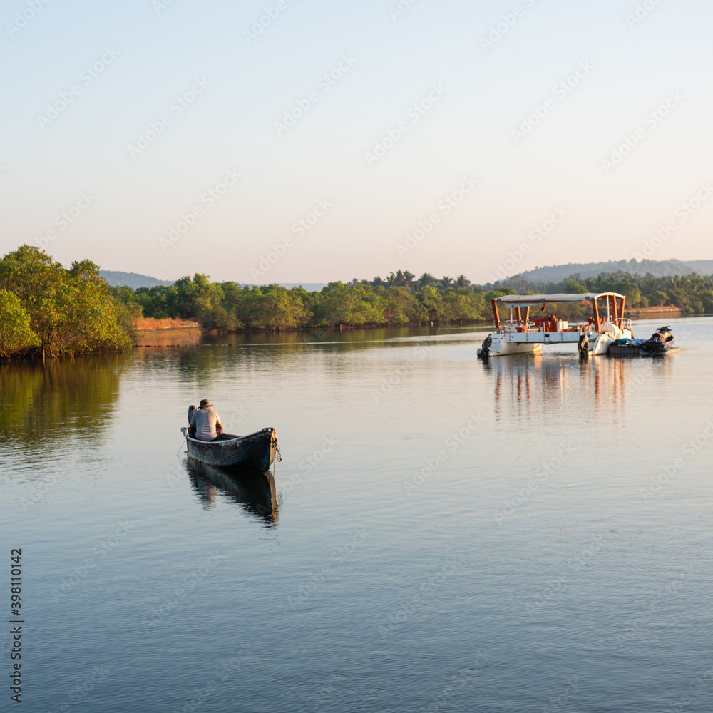 View of the landscape and Interiors from a boathouse drive in Charpora Goa. Exotic tourism in Goa.