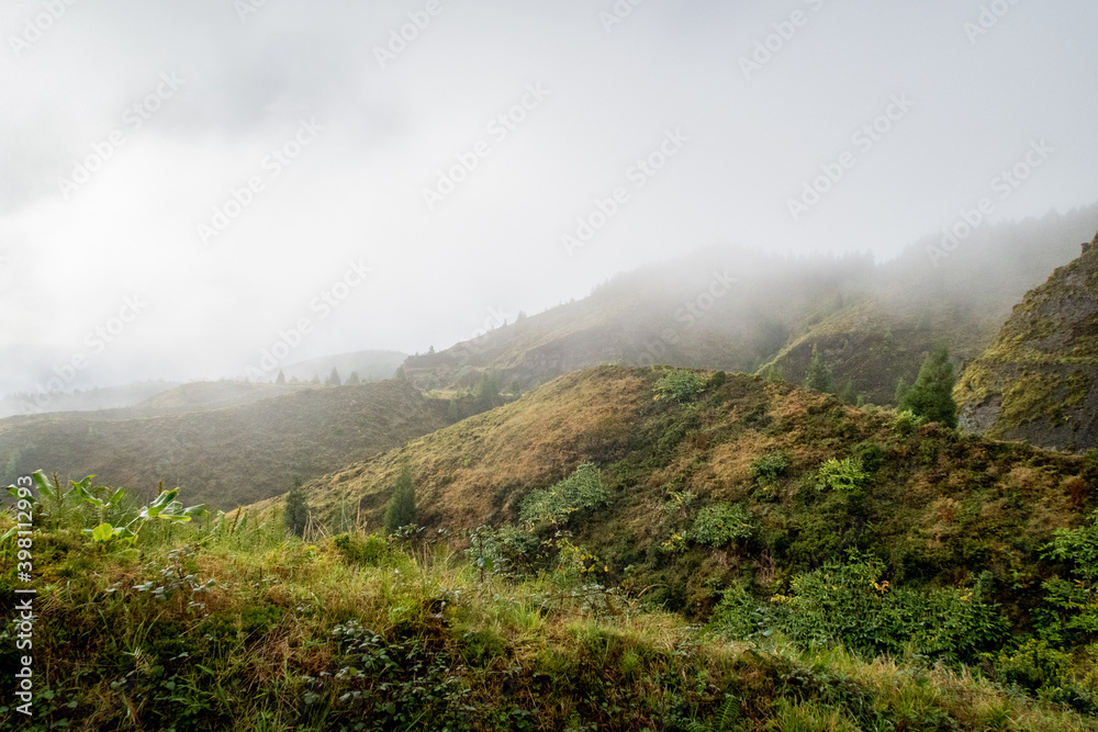 Foggy landscape in the Azores in the volcano mountains