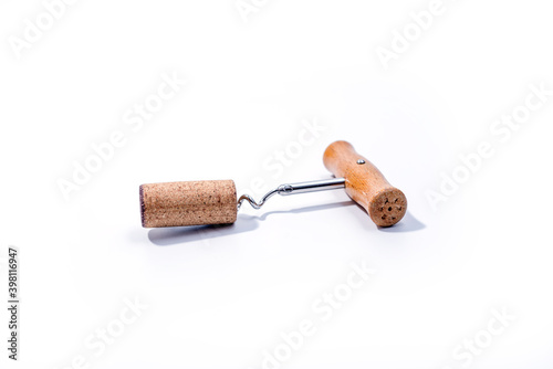 Corkscrew wine bottle opener with wooden handle isolated on white background. Close up 