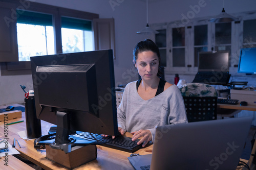 woman working in an empty coworking