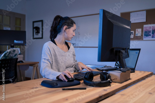 woman working in an empty coworking