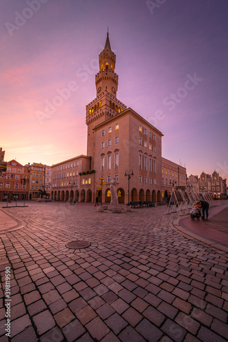 The market square with the town hall in Opole with a beautiful sunset. Autumn in Silesia, Opole, Poland.