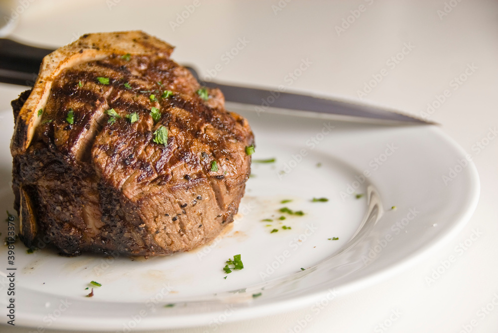 Steaks. Grade A grass fed angus beef steaks. Tenderloin, filet mignon, New York strip, bone in rib-eye grilled medium rare on outdoor wood-fired grill. Classic American steakhouse entree favorite. Steaks. Grade A grass fed angus beef steaks. Tenderloin, filet mignon, New York strip, bone in rib-eye grilled medium rare on outdoor wood-fired grill. Classic American steakhouse entree favorite.