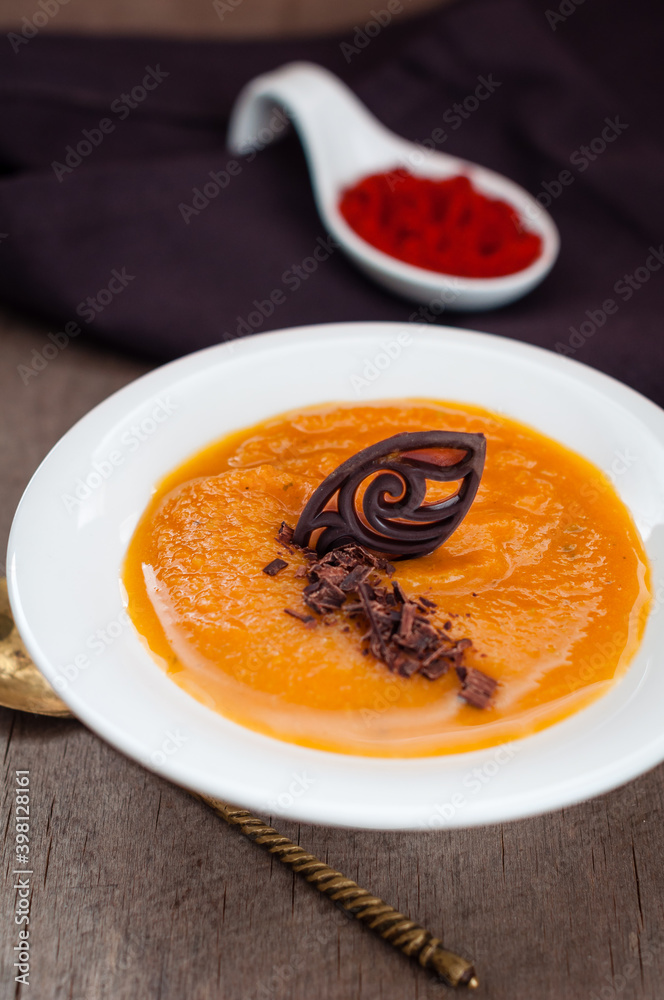 Spicy Pumpkin Soup Garnished with Chocolate Spicy Pumpkin Soup Garnished with Chocolate