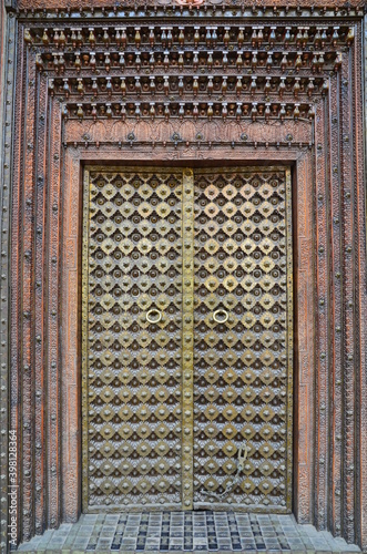 Precious door at the entrance of a beautiful haveli in Rajasthan photo