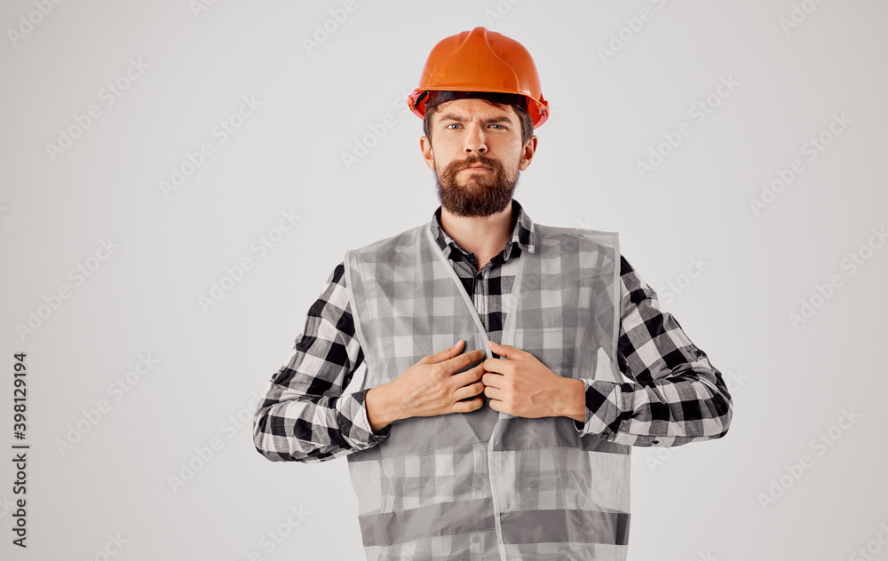 man in working uniform orange helmet construction work man in working uniform orange helmet construction work