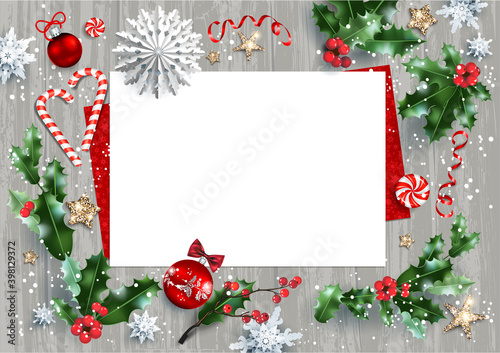 Holly branches and festive decorations
