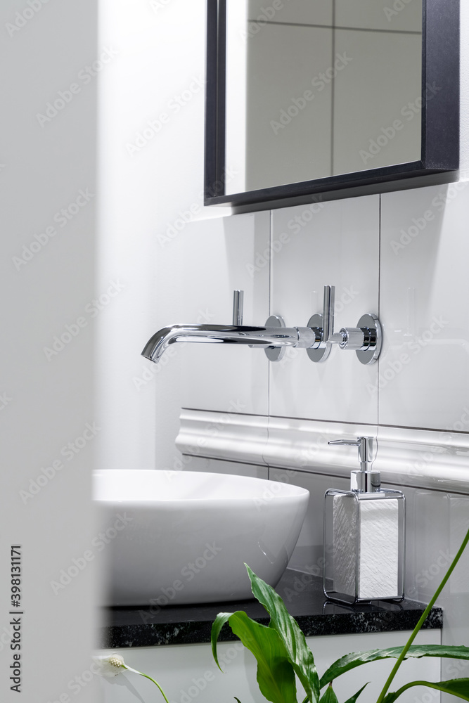 Fototapeta Stylish silver faucet in bathroom
