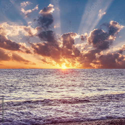 Sky over the calm surface of the sea.