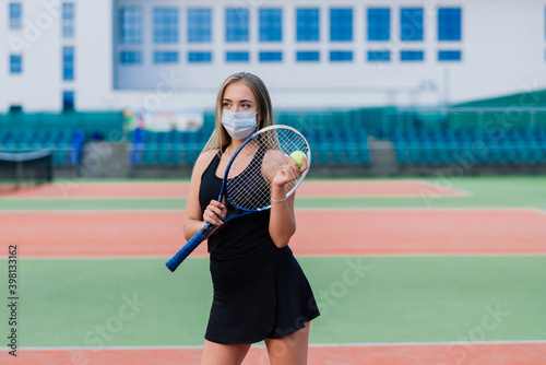 Female tennis player playing with protective mask © Ivan Zelenin