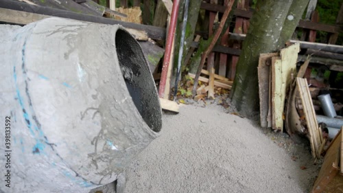 Small cement mixer mixing concrete