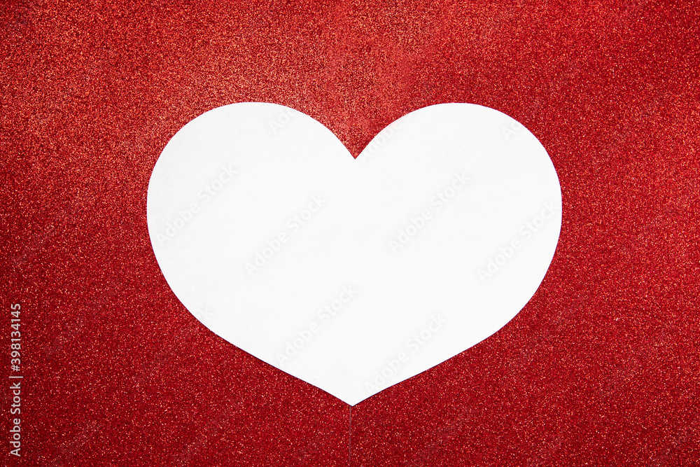 white heart on a red shiny background. Valentine's Day