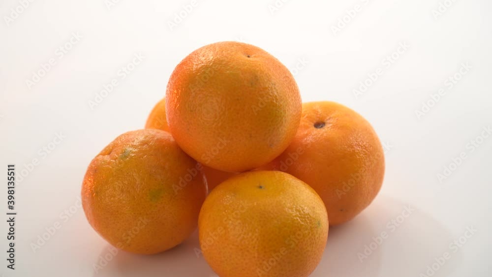bright orange ripe tangerines rotate on their axis bright orange ripe tangerines rotate on their axis