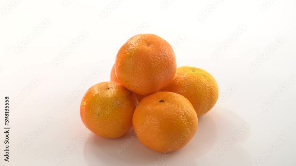 bright orange ripe tangerines rotate on their axis bright orange ripe tangerines rotate on their axis