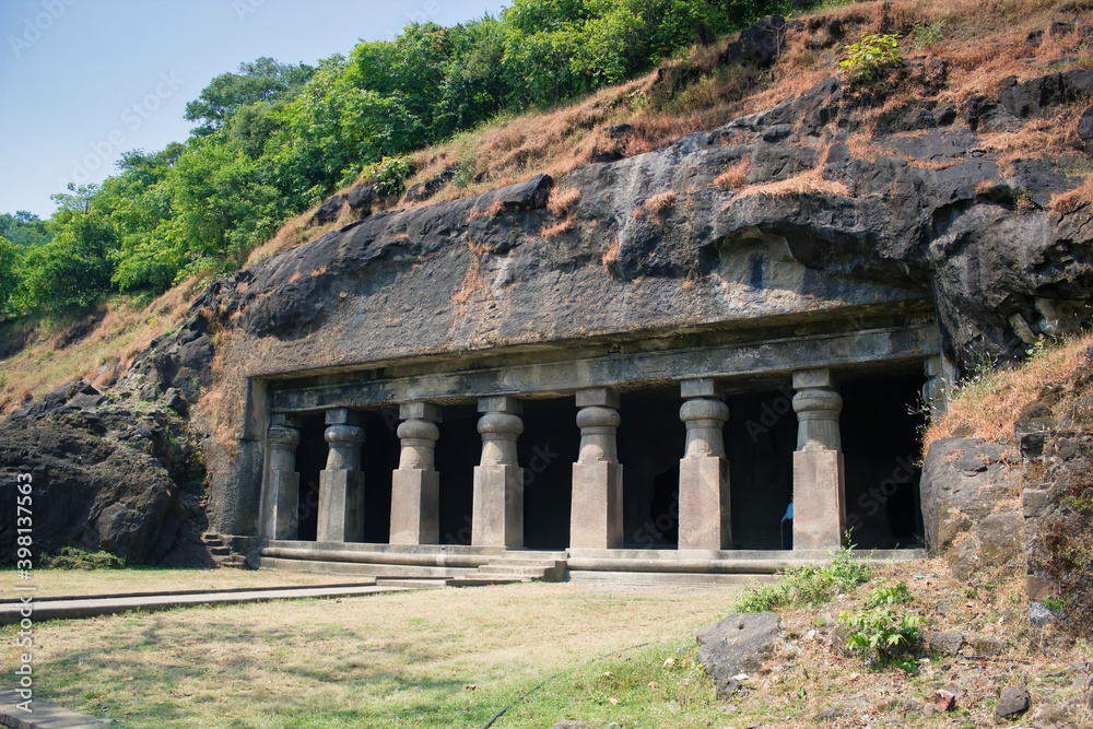 Mumbai, India: Exterior of Kanheri Caves entrance through pillars carved by cutting rock mountain located in the state of Maharashtra