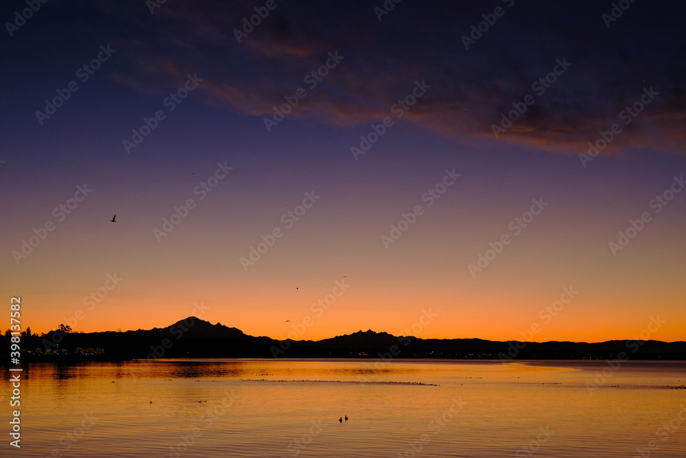 Serene sunrise over Mount Baker and Semiahmoo Bay, BC Serene sunrise over Mount Baker and Semiahmoo Bay, BC