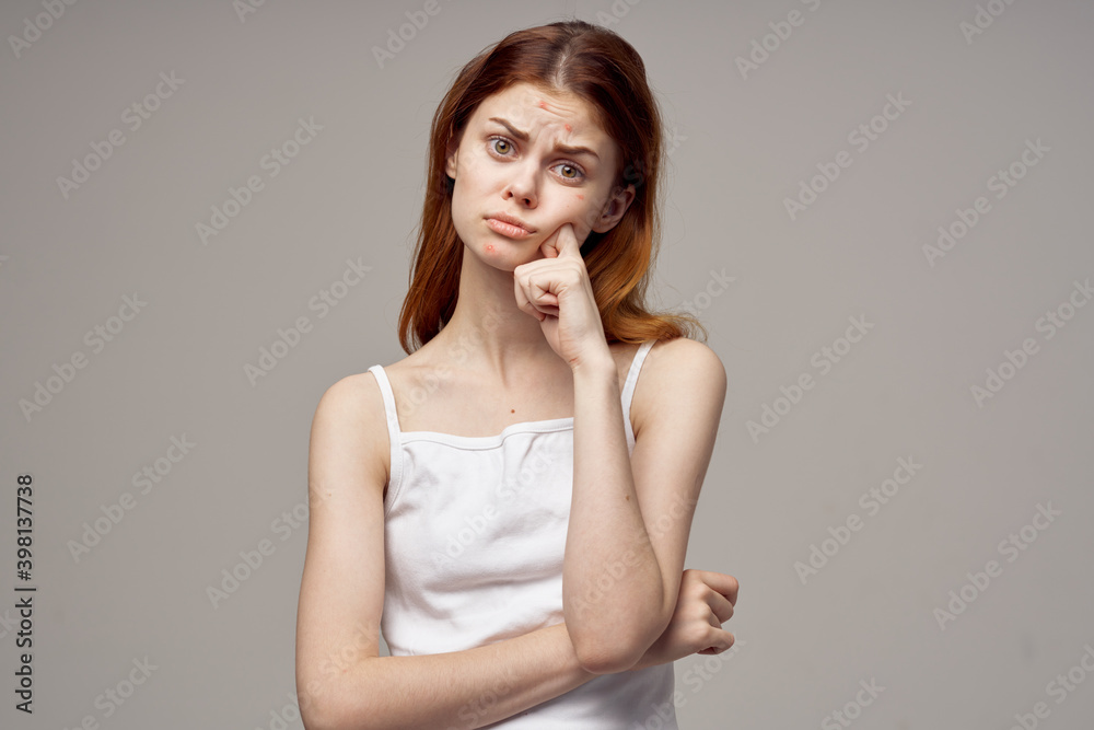 red-haired woman emotions model white t-shirt health problems red-haired woman emotions model white t-shirt health problems