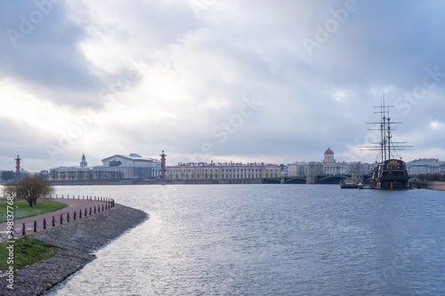 Beautiful photos of St. Petersburg  the Neva river  the cruiser Aurora  the promenade  against a cold blue sky