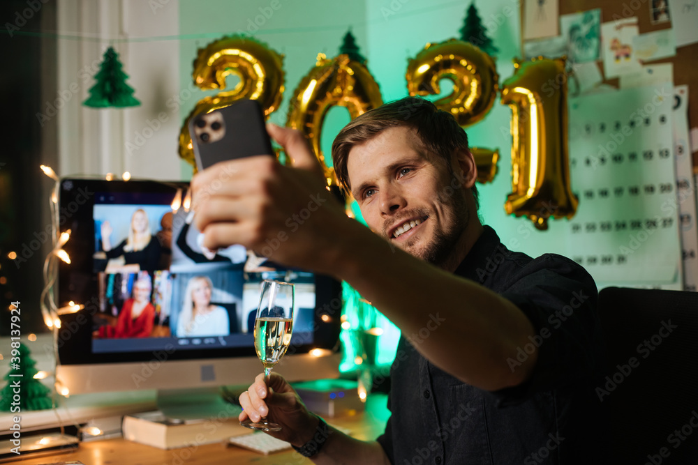 Virtual New Year 2021 meeting team teleworking. Family video call remote conference. Laptop webcam screen view. Team meet working from their home offices. Happy hour party online woman team diversity