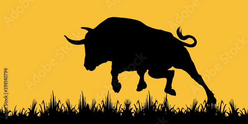  isolated black silhouette of an attacking running bull, grass, elements for design and decoration