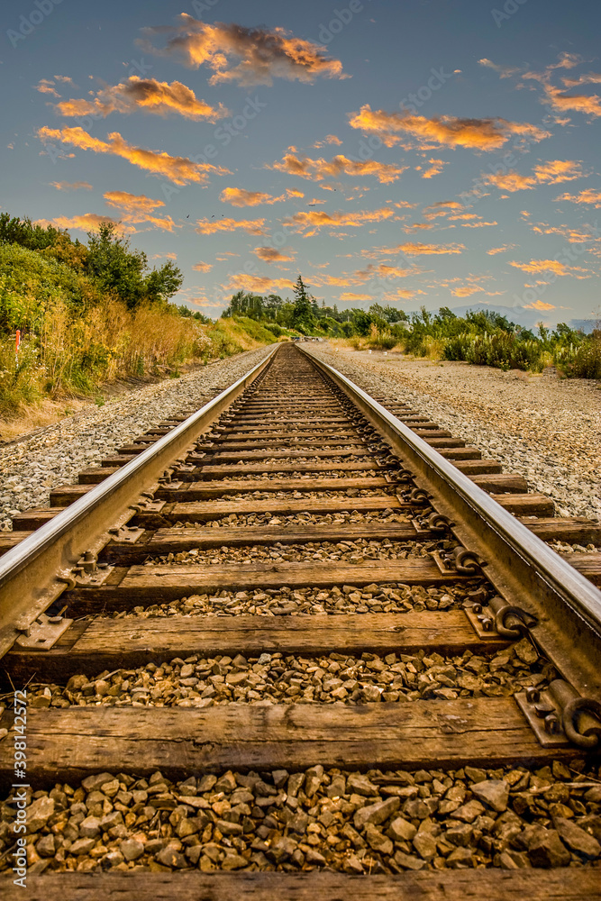 Railroad tracks disappearing into a point in the distance Railroad tracks disappearing into a point in the distance