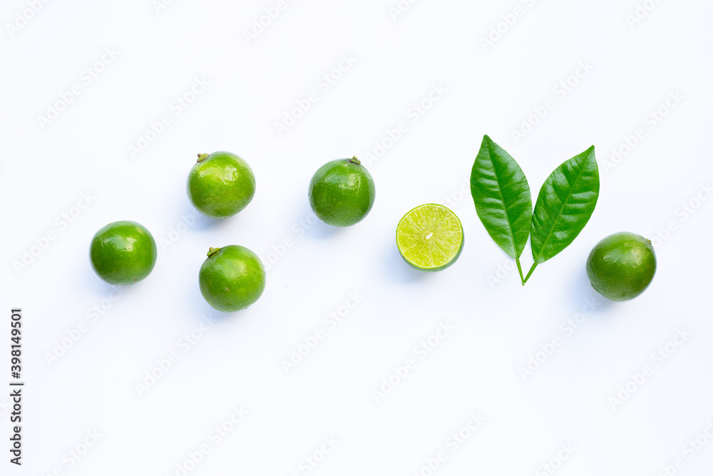 Limes with leaves isolated on white. Limes with leaves isolated on white.