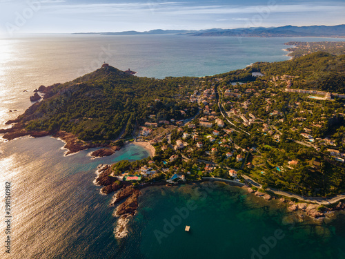 Cap le Dramont, Agay Bay, Anthéor, la Baumette and Saint Raphael scenic and panoramic Aerial view at sunset in the French Riviera, Côte d'Azur, France