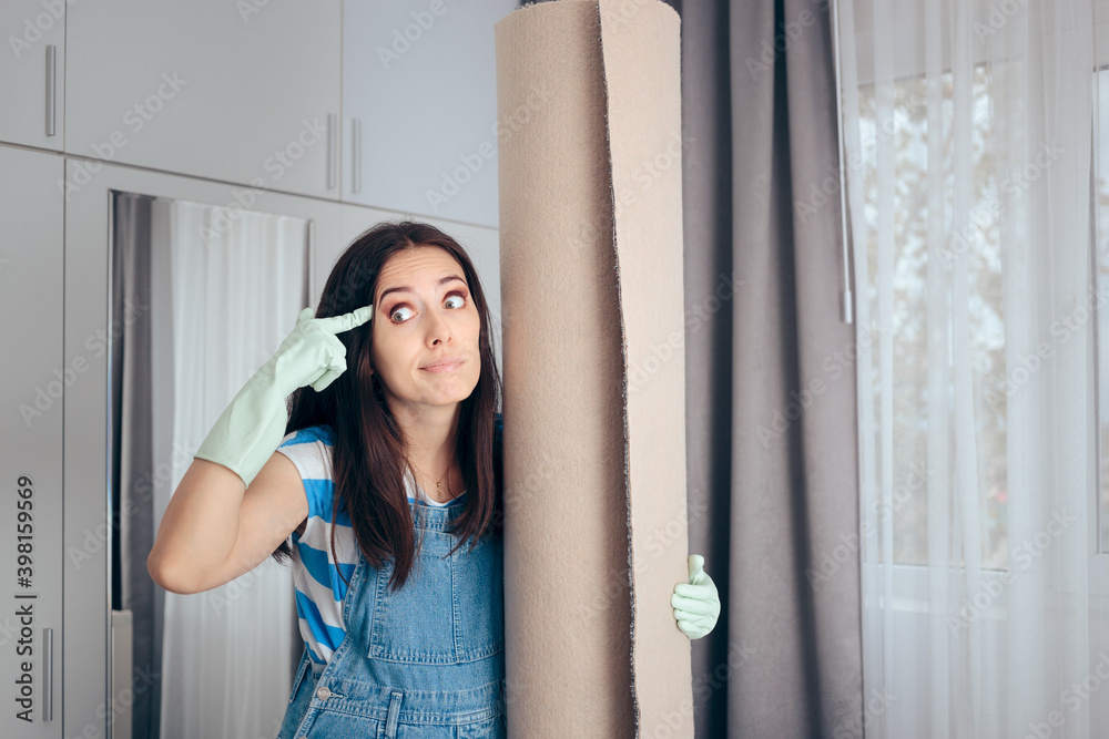 Woman Thinking about Cleaning and Redecorating Woman Thinking about Cleaning and Redecorating