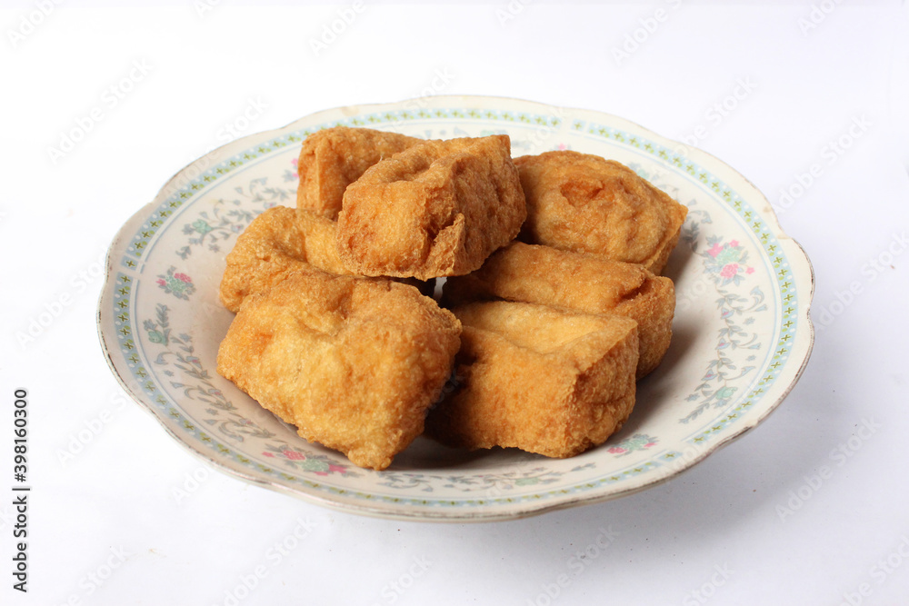 fried tofu on plate with isolated background fried tofu on plate with isolated background