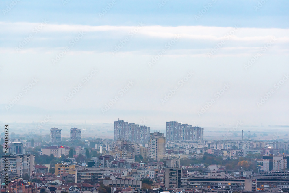 Sunset over polluted smog city environmental question conversation concept ecology nature Plovdiv, Bulgaria