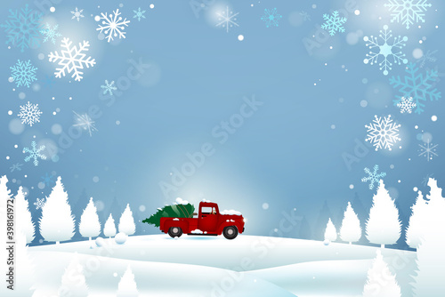 Red christmas tree truck in white snowfield surrounded by snowflakes and white pine trees