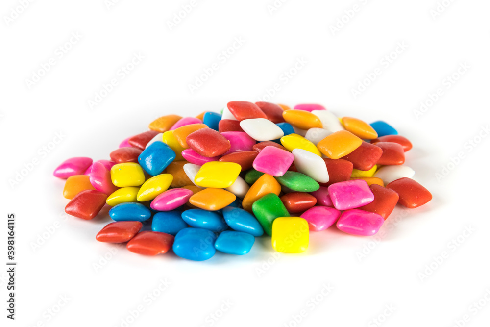 Pile of small shiny square bubble gum pieces Pile of small shiny square bubble gum pieces