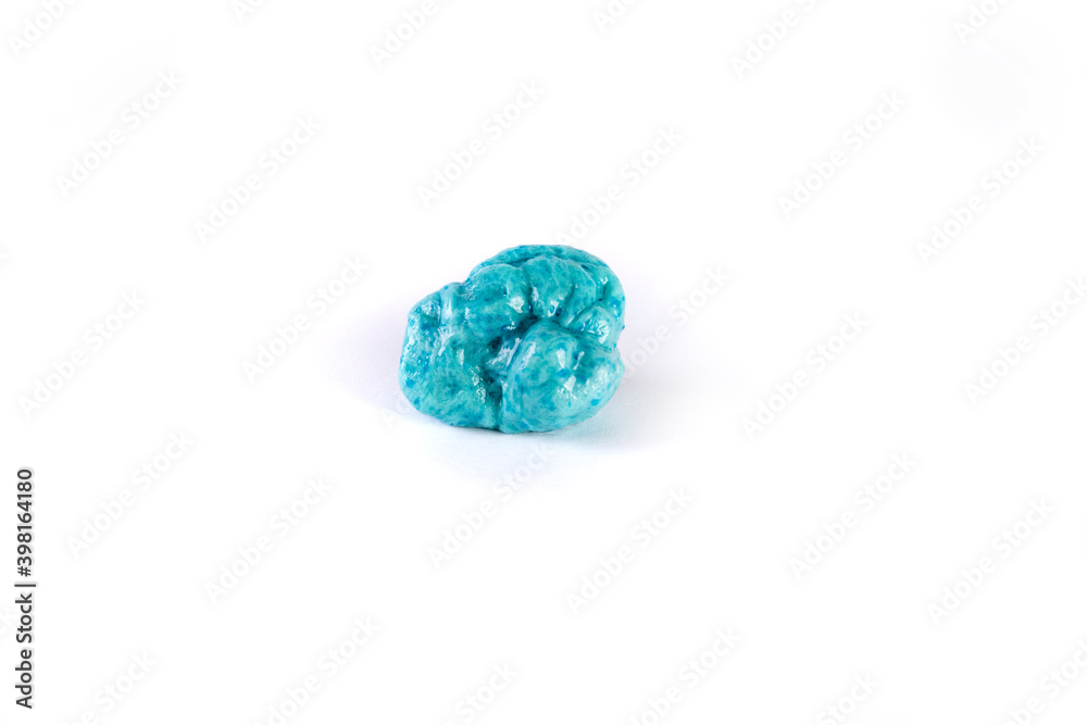 Piece of chewed blue bubble gum isolated over white Piece of chewed blue bubble gum isolated over white
