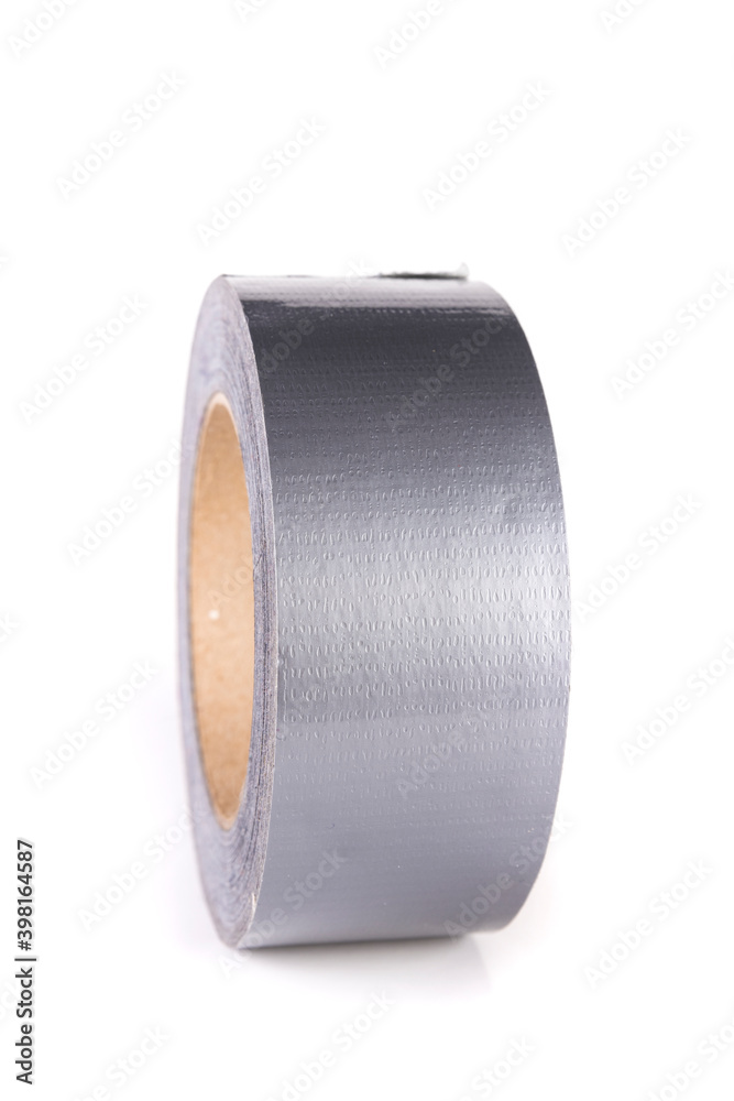 Large roll of silver shiny reflective duct tape standing up isolated over white Large roll of silver shiny reflective duct tape standing up isolated over white