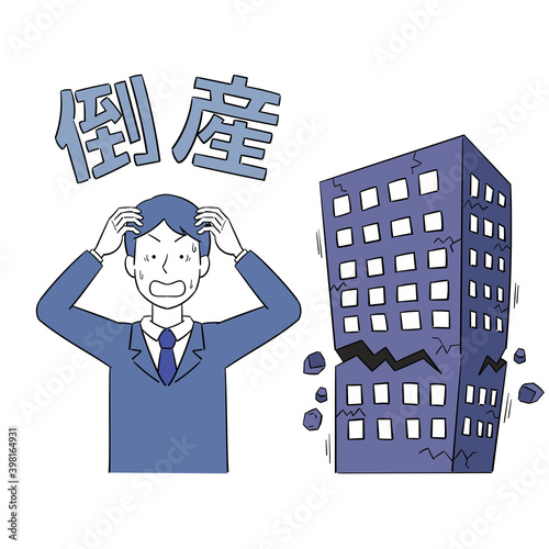 会社が倒産して頭を抱える男性