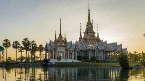 4K Time lapse Landmark of Nakhon ratchasima Temple of Wat Non Kum in Amphoe Sikhiu, Thailand at sunset time photo