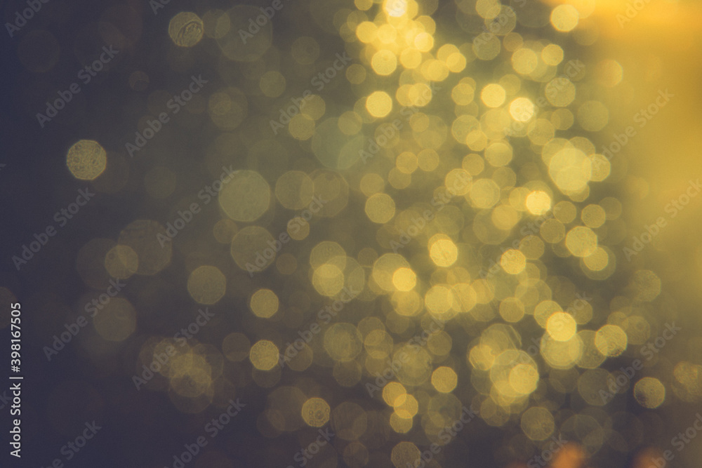 Gold bokeh blur defocus in black backgeound Gold bokeh blur defocus in black backgeound