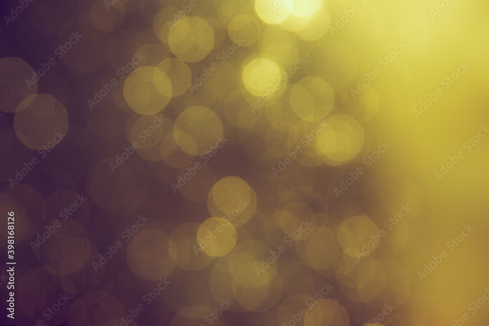 Obraz premium Gold bokeh blur defocus in black backgeound